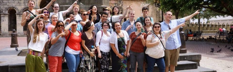 One of the things to do is visit Zona Colonial like here the students from Western Washington University Fairhaven College who stand in front of the Columbus statue in the old town of Santo Domingo.
