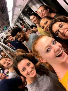 A group of Spanish language students who are learing Spanish at IIC Spanis School, Dominican Republic, in the Metro subway in Santo Domingo on the city orientation activity after the first day of class.