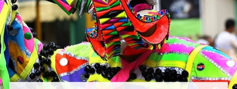 Colorful devil mask careta of the Dominican carnival which is a very authentic piece of dominican culture students learn about when learning Spanish and Dominican culture at IIC Spanish School in the Dominican Republic