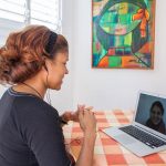IIC teacher Mily Ramirez teaching Spanish online to student Sarah Kallali in Switzerland.
