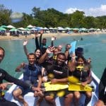 Staff and students learning Spanish at IIC Spanish School in Sosua, Dominican Republic, enjoy their first scuba diving experience in Sosua Bay.